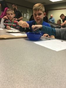 Employees Children and Family Friends learn about Batteries and the Science behind them