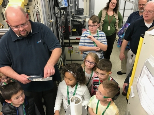 Employees Children and Family Friends learn about Batteries and the Science behind them